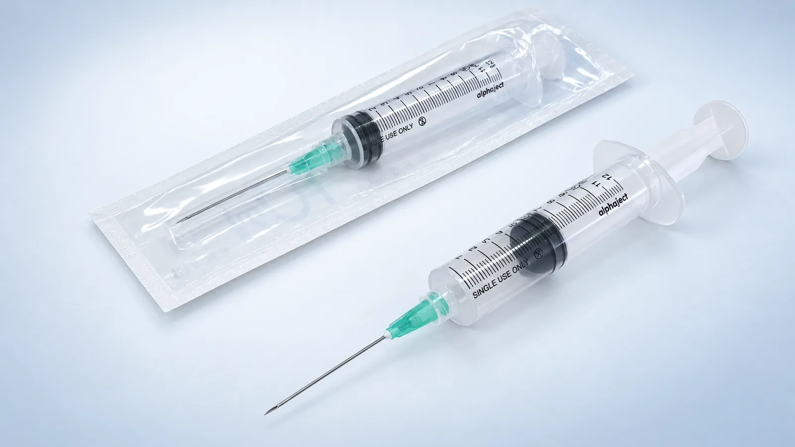 Representative studio presentation of a sterile single-use syringe and blister package